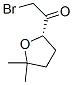 141072-75-5,Ethanone, 2-bromo-1-(tetrahydro-5,5-dimethyl-2-furanyl)-, (S)- (9CI)